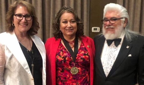 Moreno Valley Mayor Pro Tem Victoria Baca (center) with Assemblymember Eloise Reyes (Dist. 47) and Danny Morales, Exec. Dir. of Librería del Pueblo, Inc., after being recognized with the Woman of Achievement award