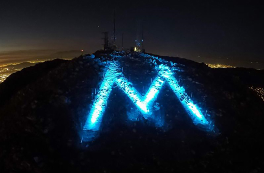 The M lit blue.
