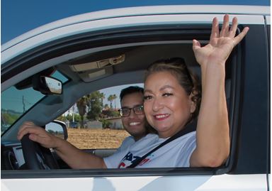 Councilmember Baca and Mayor Gutierrez in a car.