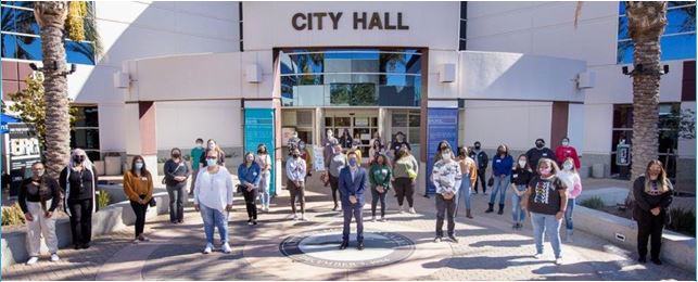 College students in front of MV City Hall.