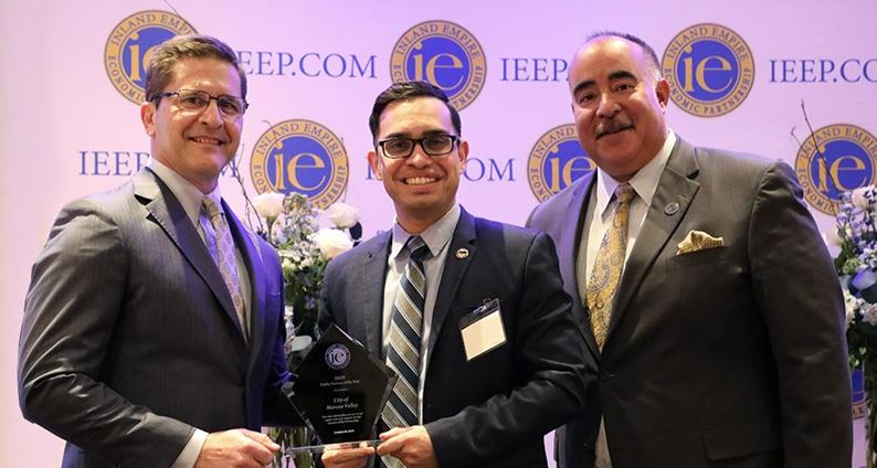 Dr. Yxstian Gutierrez, Mayor of Moreno Valley, accepts the Inland Empire Economic Partnership's award for the City as Public Partner of the Year.
