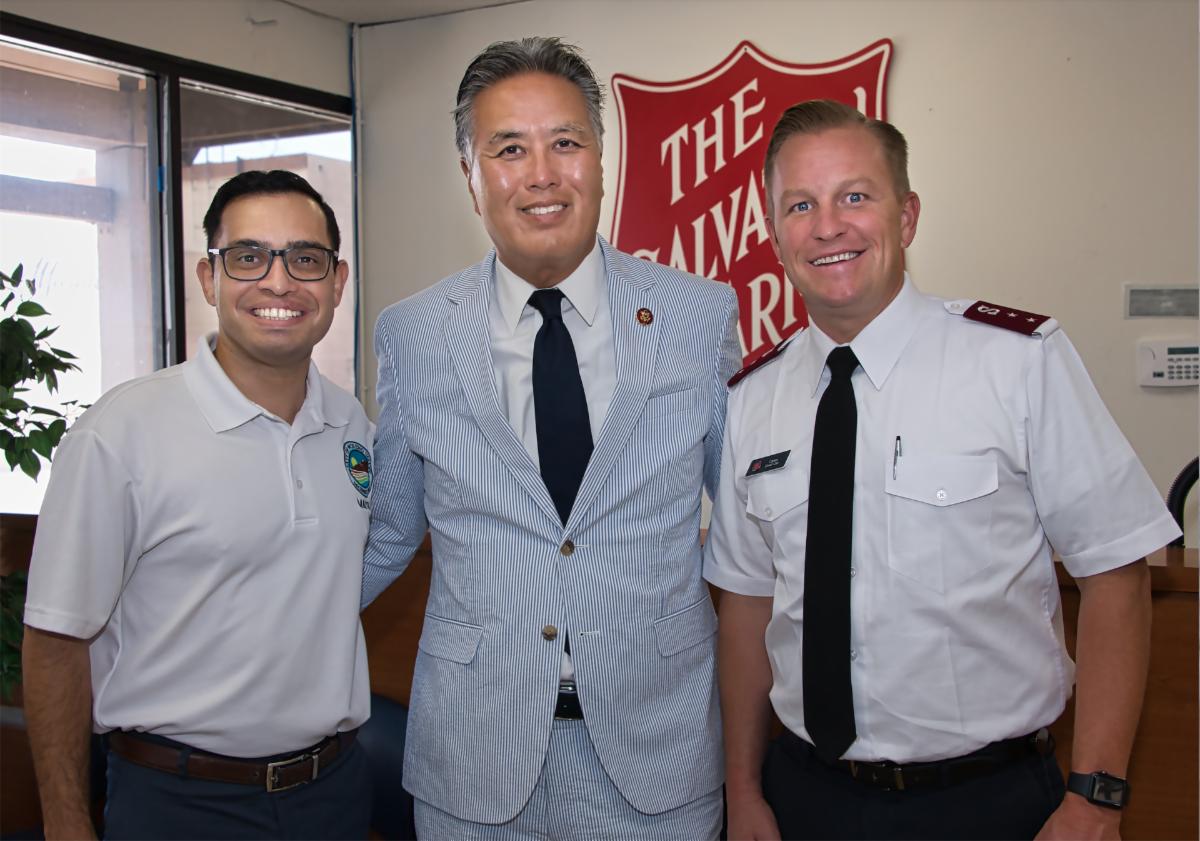 Photo of Moreno Valley Mayor, Dr. Yxstian Gutierrez, Representative Mark Takano, and Captain David Cain of The Salvation Army
